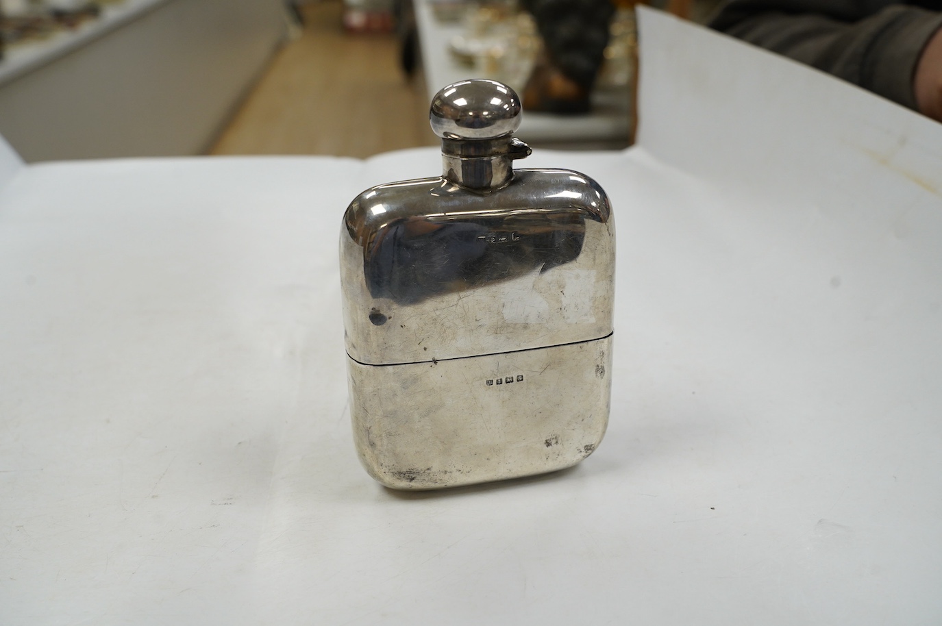 A George V silver hip flask, by Charles S. Green & Co, Birmingham, 1917, 14.5cm. Condition - poor